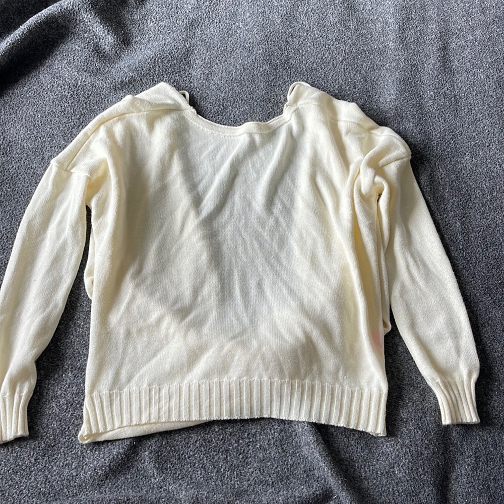 Backless white sweater